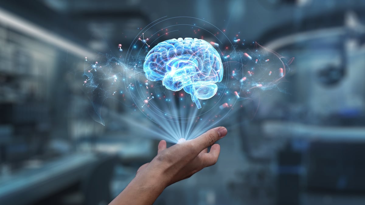 A hand holding a holographic brain in a laboratory, connecting medical data to analyze symptoms